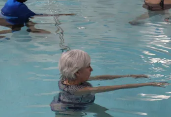 Three Members in Rooke Pool Exercising