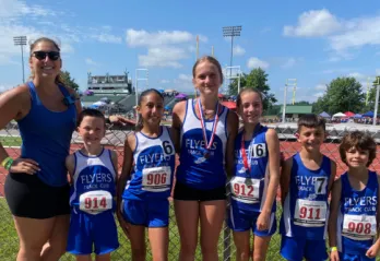Flyers Track Team with their coach
