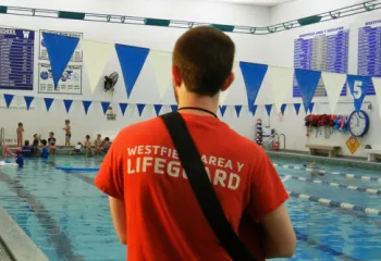 Westfield Area Y Lifeguard looking out at Wallace Pool