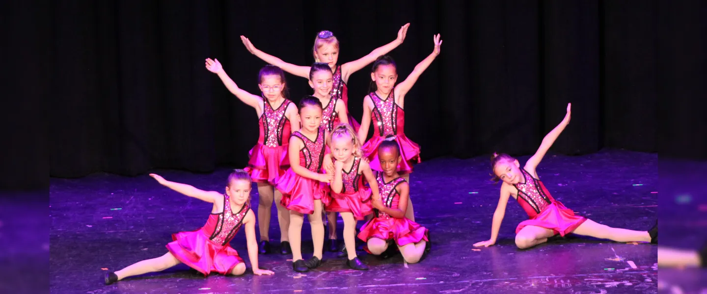 9 dancers on stage