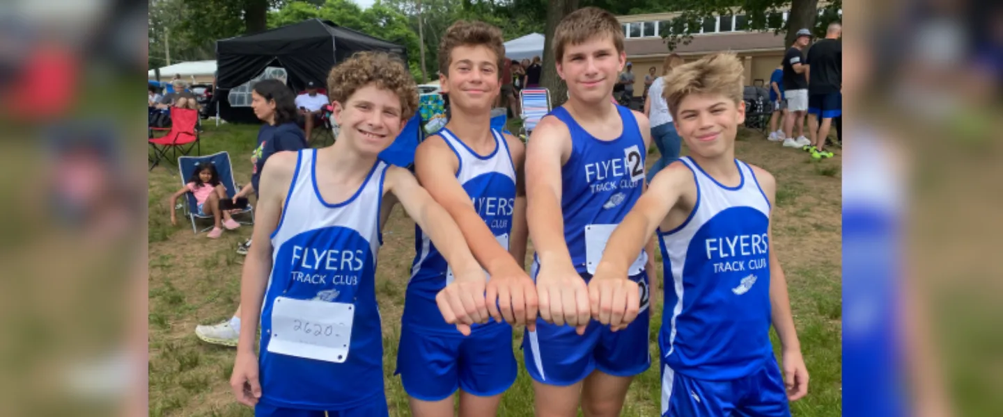 Four Flyers athletes at a race