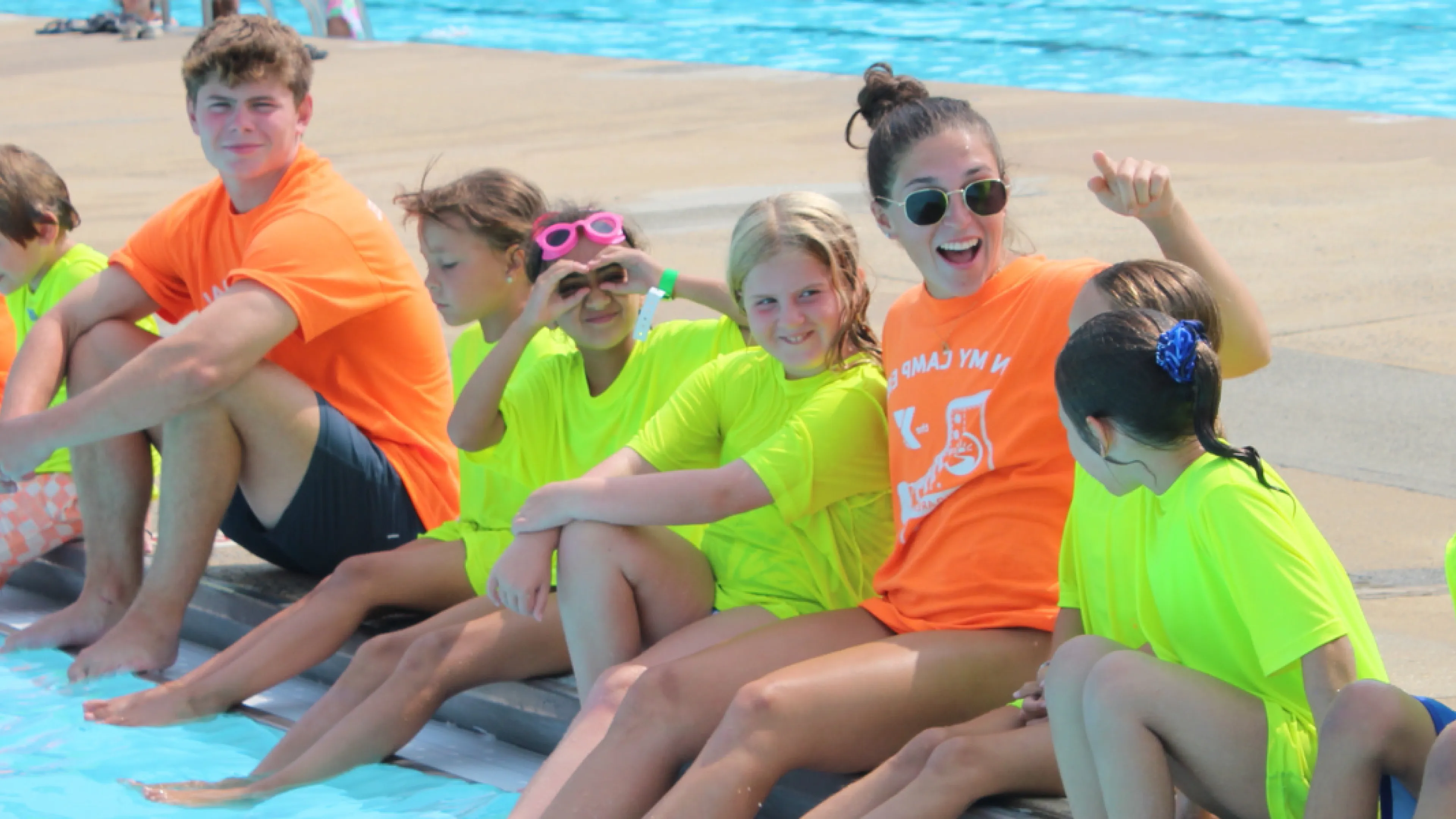 Pioneer campers and counselors at the outdoor pool