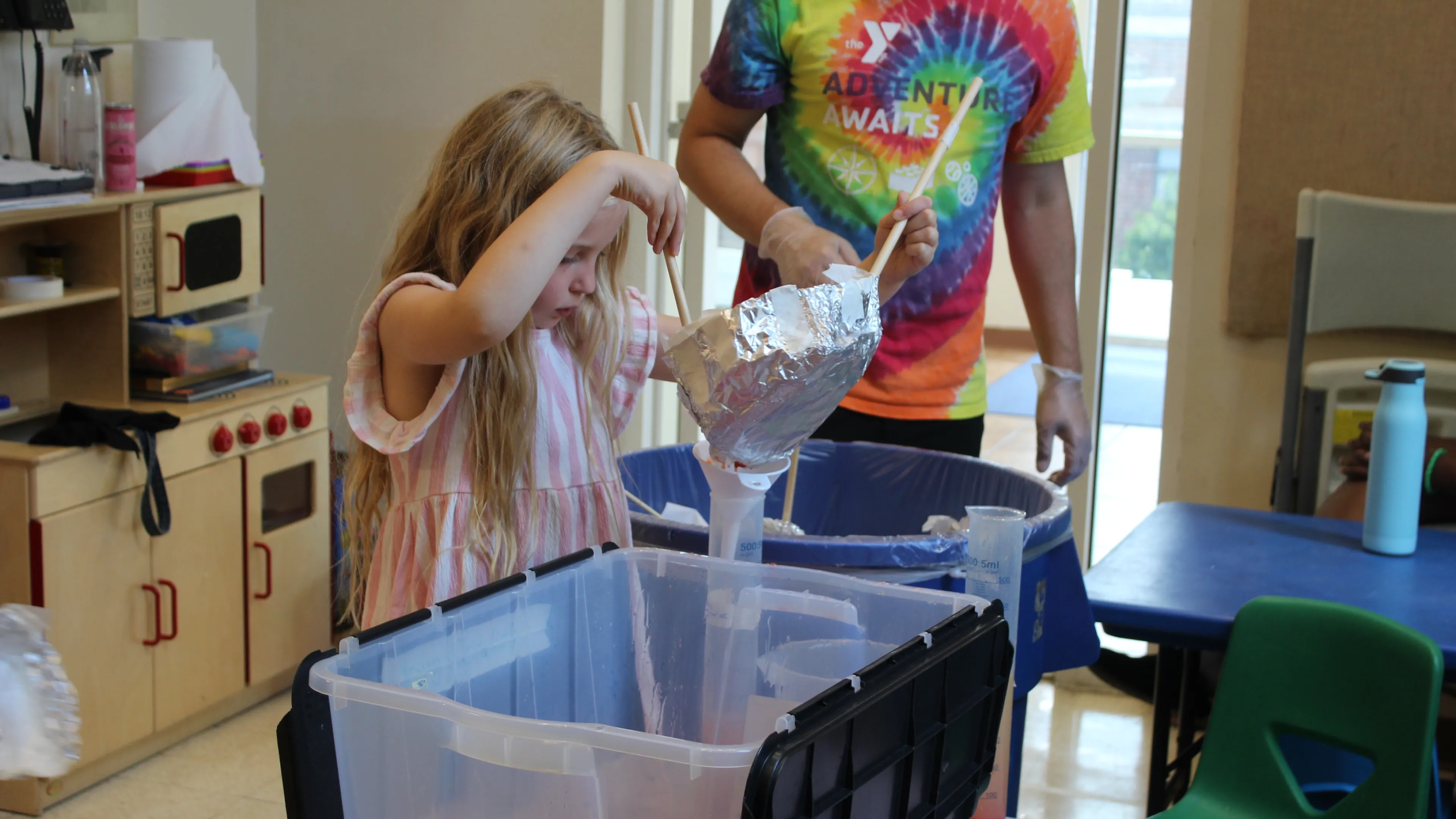 Child doing science experiment