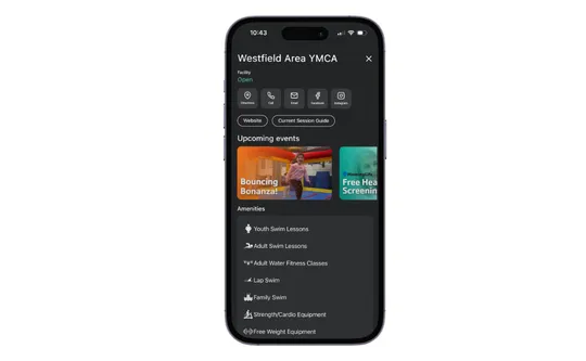 Screenshot of the Westfield Area YMCA mobile app location page displayed on a smartphone. The screen shows facility status marked “Open,” social media icons, Website and Current Session Guide buttons, an Upcoming Events section with event thumbnails, and an Amenities list including youth swim lessons, adult swim lessons, water fitness classes, lap swim, family swim, strength/cardio equipment, and free weight equipment.