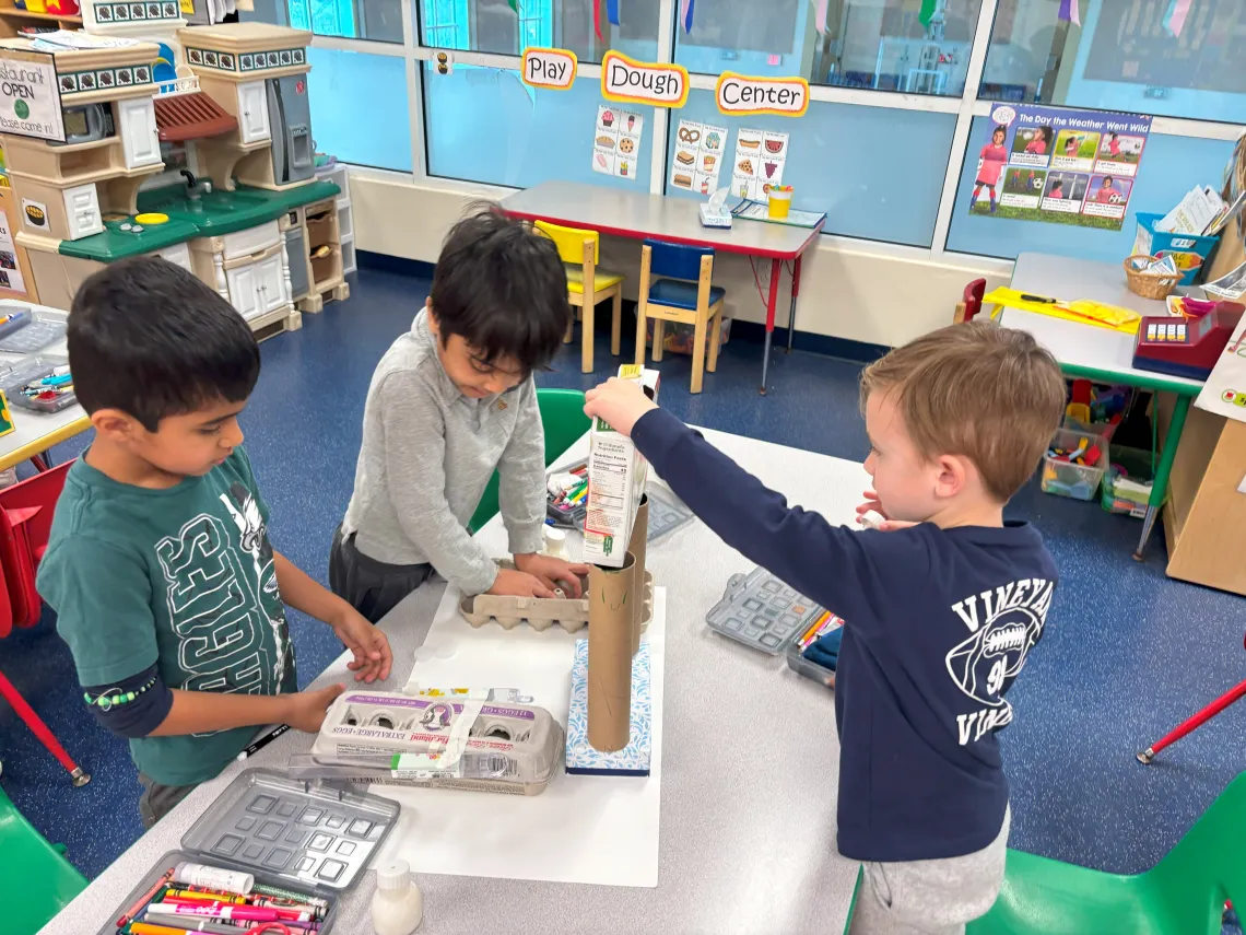 Kindergarten students doing arts and crafts