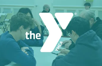 Senior Tech Buddies helping at a previous bring your device for free advice event