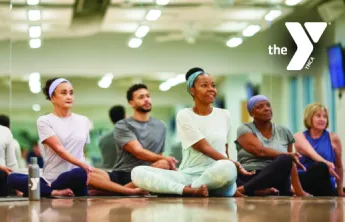 Y USA photo of members stretching with a Y logo