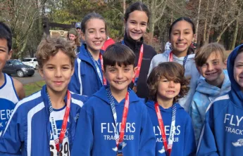 Pictured (left to right): Flyers athletes Slater Centeno, Leo Anspach, Greyson Dunleavy, Sandra Jakubiuk, Sarah Licata, James Bedara, Katalyna Aguilar, Hudson Dunleavy, and Grayson Van Dyk.