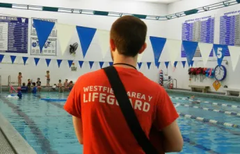 Westfield Area Y Lifeguard looking out at Wallace Pool