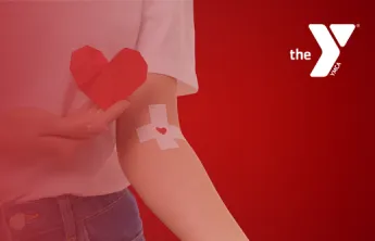 Y Logo with blood drive donor's arm with a bandage and a heart