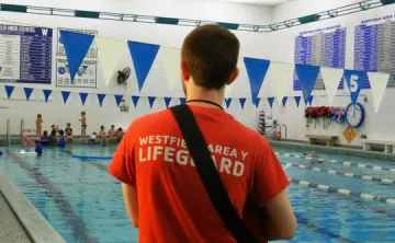 Westfield Area Y Lifeguard looking out at Wallace Pool
