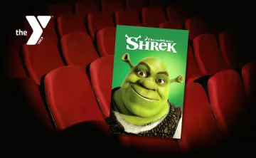 Movie theater seats with a Y logo and Shrek movie cover